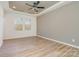 Spacious bedroom with hardwood floors and ceiling fan at 828 Cabaniss Dr, Shelby, NC 28150