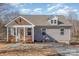 House with a front porch, landscaping and driveway at 828 Cabaniss Dr, Shelby, NC 28150