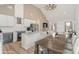 Modern kitchen with white cabinets, granite countertops, and stainless steel appliances at 828 Cabaniss Dr, Shelby, NC 28150