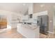 Modern kitchen with white cabinets and granite countertops at 828 Cabaniss Dr, Shelby, NC 28150