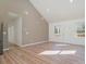 Spacious living room with high ceilings, large windows, and hardwood floors at 828 Cabaniss Dr, Shelby, NC 28150