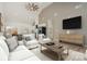 Open concept living room with vaulted ceilings, hardwood floors, and kitchen access at 828 Cabaniss Dr, Shelby, NC 28150