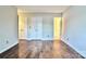 Spacious bedroom with hardwood floors and double closets at 8316 Rust Wood Pl, Charlotte, NC 28227