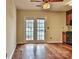 Cozy kitchen area featuring hardwood floors and a door leading to the outside at 8316 Rust Wood Pl, Charlotte, NC 28227