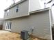 Side view of house with AC unit at 8540 Filbert Ln, Charlotte, NC 28215