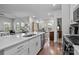 Modern kitchen with white cabinets, stainless steel appliances, and an island at 8932 Pennegrove Cir, Charlotte, NC 28214