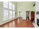 Spacious living room with hardwood floors and large windows at 9021 Gander Dr, Charlotte, NC 28277