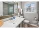 Bright bathroom with a glass shower and gray vanity at 914 Jaywood Ln, Matthews, NC 28105