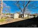 Large backyard with storage shed and workshop at 947 Ravendale Dr, Charlotte, NC 28216