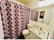 Clean bathroom featuring a shower/tub combo and updated vanity at 947 Ravendale Dr, Charlotte, NC 28216