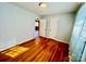 Spacious bedroom with hardwood floors and access to another room at 947 Ravendale Dr, Charlotte, NC 28216
