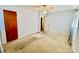Simple bedroom with carpet flooring and ample closet space at 947 Ravendale Dr, Charlotte, NC 28216