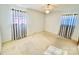 Well-lit bedroom with carpet flooring and ceiling fan at 947 Ravendale Dr, Charlotte, NC 28216