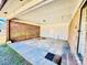 Covered carport with brick and wood siding at 947 Ravendale Dr, Charlotte, NC 28216