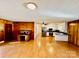 Open living room and kitchen with hardwood floors at 947 Ravendale Dr, Charlotte, NC 28216