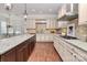 Modern kitchen featuring granite counters and custom cabinetry at 9713 White Frost Rd, Charlotte, NC 28277