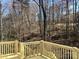 Wooden deck overlooking a wooded area with tall trees at Lot 72.73 Sally Clark Dr, Denver, NC 28037