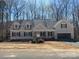 Charming one-story home featuring a side entry garage, dormer windows and a welcoming covered porch at Lot 72.73 Sally Clark Dr, Denver, NC 28037