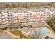 Complex overview showcasing building, parking, and pool at 1000 E Woodlawn Rd # 105, Charlotte, NC 28209