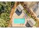 Overhead view of community pool and surrounding landscape at 1000 E Woodlawn Rd # 105, Charlotte, NC 28209