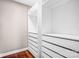 Spacious walk-in closet with ample shelving and drawers at 1000 E Woodlawn Rd # 105, Charlotte, NC 28209