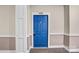 Apartment building entry with blue door and number 105 at 1000 E Woodlawn Rd # 105, Charlotte, NC 28209