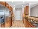 Modern kitchen with stainless steel appliances and granite countertops at 1000 E Woodlawn Rd # 105, Charlotte, NC 28209