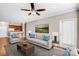Living room with hardwood floors and kitchen views at 1000 E Woodlawn Rd # 105, Charlotte, NC 28209