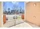 Private patio with brick accents and a view of the parking lot at 1000 E Woodlawn Rd # 105, Charlotte, NC 28209