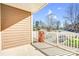 Private patio with brick and siding, offering a tranquil view at 1000 E Woodlawn Rd # 105, Charlotte, NC 28209
