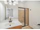 Clean bathroom with walk-in shower, modern vanity, and large mirror at 106 N Laurel Ave # 120, Charlotte, NC 28207