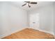 Bright bedroom with hardwood floors and double doors at 106 N Laurel Ave # 120, Charlotte, NC 28207