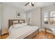 Spacious bedroom with large windows and hardwood floors at 106 N Laurel Ave # 120, Charlotte, NC 28207