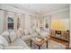 Spacious living area with large sectional sofa and plenty of natural light at 106 N Laurel Ave # 120, Charlotte, NC 28207