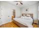 Spacious bedroom with ceiling fan, hardwood floors and private bathroom at 106 N Laurel Ave # 120, Charlotte, NC 28207