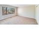 Well-lit bedroom with neutral walls and carpeting at 1213 Jules Ct, Charlotte, NC 28226