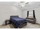Spacious bedroom with a queen-size bed and sitting area at 140 Colonial Reserve Ave, Troutman, NC 28166