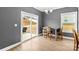 Bright dining area with sliding glass doors leading to the backyard at 140 Colonial Reserve Ave, Troutman, NC 28166