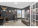 Home office features built-in shelving and comfortable seating at 140 Colonial Reserve Ave, Troutman, NC 28166