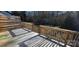 Simple wooden deck with a view of a backyard and trees at 153 Saluda St, Chester, SC 29706