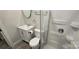 Clean bathroom with a shower/tub combo, toilet and vanity at 153 Saluda St, Chester, SC 29706