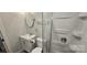 Clean bathroom with a shower/tub combo, toilet and vanity at 153 Saluda St, Chester, SC 29706