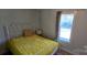 Charming bedroom with a full bed and large window at 153 Saluda St, Chester, SC 29706