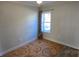 Bedroom featuring a window with curtains and patterned rug at 153 Saluda St, Chester, SC 29706
