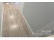 Light grey painted hallway with wood-look flooring at 153 Saluda St, Chester, SC 29706