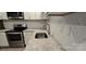 Modern kitchen with stainless steel appliances and granite countertops at 153 Saluda St, Chester, SC 29706