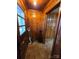 Entryway with wood paneling and tiled floors at 160 Williamson St, Troy, NC 27371