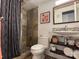 Modern bathroom with stone tile shower and floating vanity at 201 S Hoskins Rd # 136, Charlotte, NC 28208