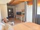 Bedroom with built-in shelving and a TV at 201 S Hoskins Rd # 136, Charlotte, NC 28208