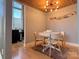 Charming dining area with a round table and four chairs at 201 S Hoskins Rd # 136, Charlotte, NC 28208